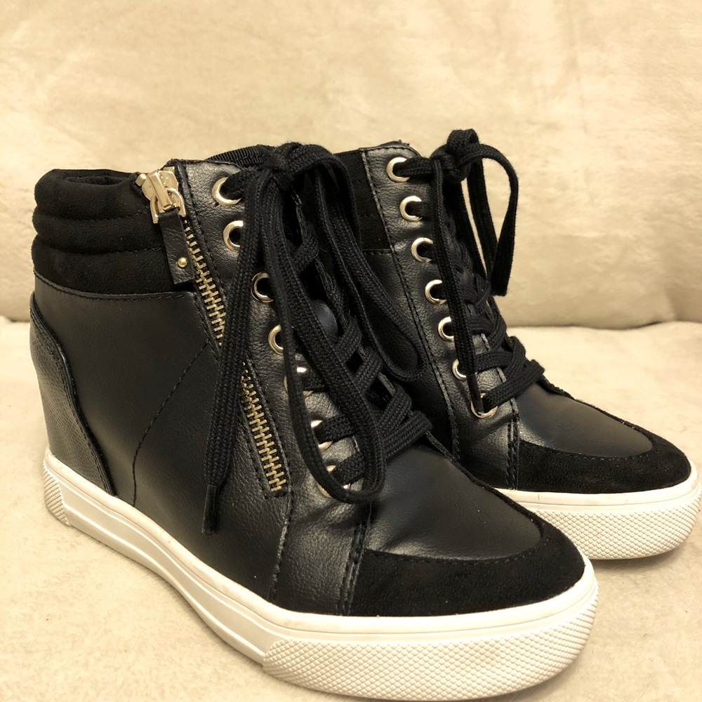 Black Aldo hidden wedge heel sneakers size 5.